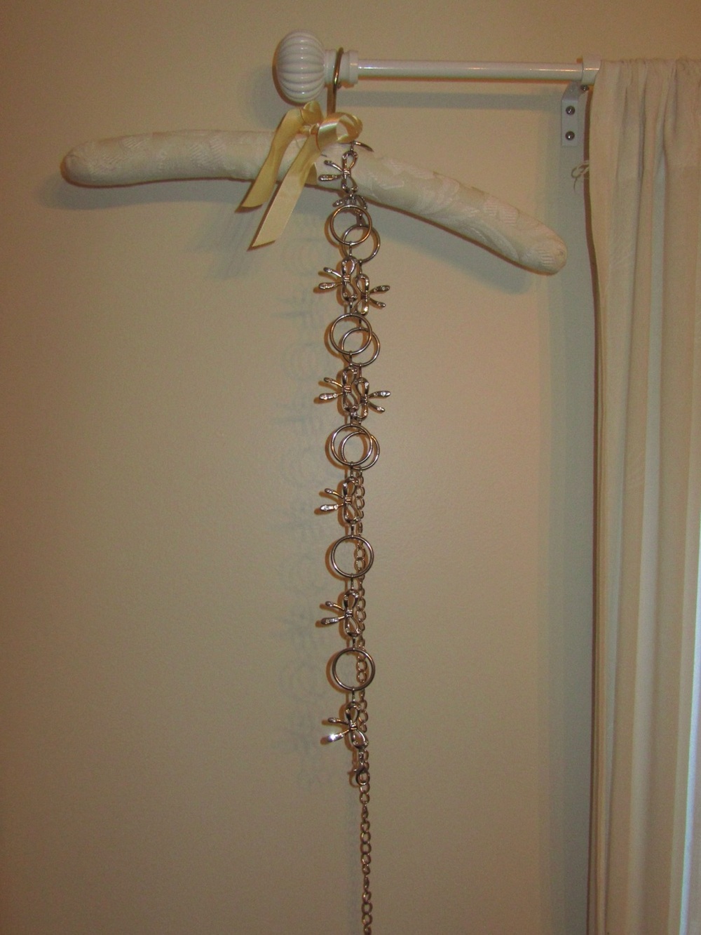 Silver-tone Bow and Ring charm Link Belt